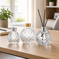 Bouteille diffuseur en verre rond de haute qualité 100 ml 250 ml avec bouchon à vis pour diffuseur d'huiles essentielles
