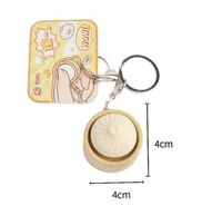 Nouveauté : Porte-clés anti-stress en forme de panier de petits pains vapeur, mignon et écologique, mini pendentif de décompression à presser pour sac à dos
