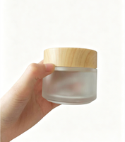 Pot en verre transparent ambré noir personnalisé avec logo OEM, vide, 5g-100g, pour crème visage, sérum, emballage cadeau cosmétique de luxe.