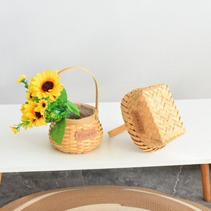 Hand-woven <b>flower</b> basket, straw <b>flower</b> basket, wooden chip hand-woven <b>flower</b> basket, rattan hand-woven <b>flower</b> basket, pastoral - Product Image 1