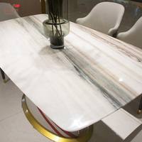 Ensemble de table à manger moderne italienne stable pour 6 personnes, avec plateau en marbre miroir, structure en bois massif, base recouverte de cuir blanc, salle à manger de luxe
