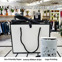 Sac de courses pliable en papier d'art biodégradable de luxe, avec logo personnalisé, sac cadeau pour fête, vente en gros de vêtements et chaussettes, avec lamination