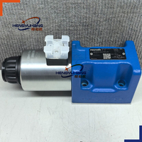 Vanne de commande directionnelle hydraulique R901278772 4WE10C5X/EG24N9K4/M NG10 CETOP 5, électrovanne 24V DC 350 bars avec commande manuelle