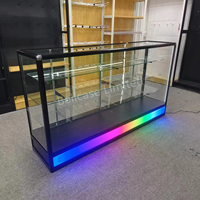 Vitrine en verre en promotion pour magasin de tabac, avec éclairage coloré et cadre en aluminium verrouillable