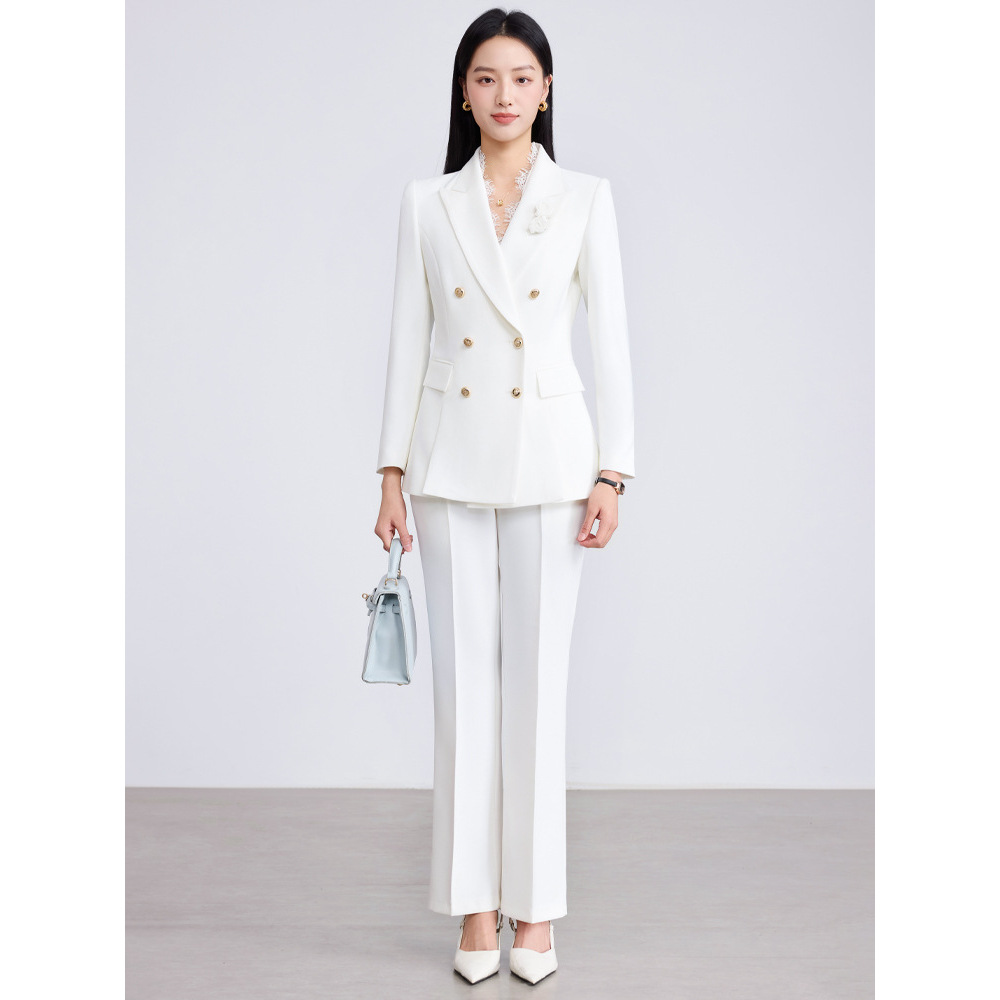 White suit with slightly flared trousers