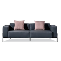 Dieses luxuriöse schwarze Ledersofa-Set mit schlichtem Design eignet sich für den Einsatz in Home-Office-Lounges und Büros.