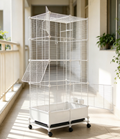 Cage à oiseaux en métal noir et blanc avec base mobile à roulettes, plateau en plastique, design simple, grand espace de jeu, portes latérales, alimentation