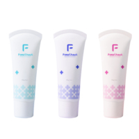 Tube de crème pour le corps en plastique avec tête de massage
