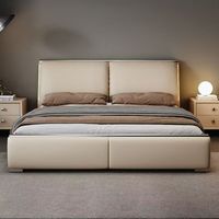 Lit de rangement king size moderne et luxueux avec revêtement en cuir véritable, design de lit moelleux pour petits appartements