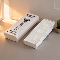 Boîte à rasoir personnalisée blanche, noire et grise avec logo, en carton rigide, avec gaufrage et pelliculage mat