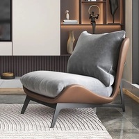 Fauteuil de relaxation moderne et luxueux avec repose-pieds, design tendance pour salon, balcon ou chambre, en promotion.
