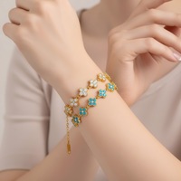 Nouveauté Bracelet trèfle à quatre feuilles en zircon coloré, bracelet léger de luxe en acier inoxydable et titane, bijoux pour femmes