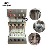 Machine automatique pour la fabrication de cornets de glace croustillants, de gaufrettes, de coupes à sucre, de rouleaux d'œufs et de cornets de gaufres
