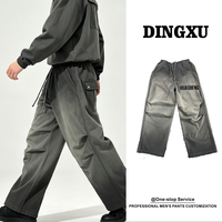 Pantalon cargo large pour homme, gris vert délavé, coupe ample, cordon de serrage à l'ourlet, poches à rabat arrière, boutons-pression, style utilitaire