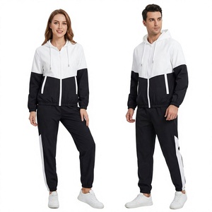 Ensemble de survêtement unisexe imperméable 100 % nylon léger pour l'hiver, style streetwear, avec veste à capuche zippée et pantalon long, color block, sportif - Product Image 1