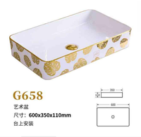 Lavabo en céramique simple de style européen avec robinet doré Design moderne pour table de salle de bain d'hôtel Lavabo de table de toilette créatif
