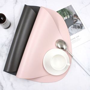 Unique Irregular PU Placemat Washable Heat Resistant Table Mat Perfect for Home Dining, Parties, and Events - Product Image 3