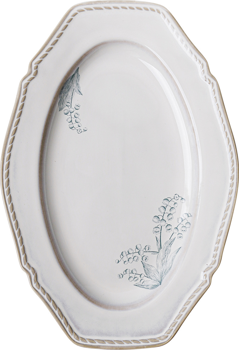 Assiette à œufs blanche