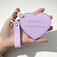 Petit miroir de poche rotatif en cuir PU en forme de cœur avec mousqueton, pour maquillage et cosmétiques, personnalisable avec logo