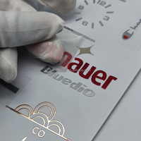 Autocollant de logo en métal transparent de précision électroformé personnalisé |   Étiquette adhésive ultra-fine en nickel pour emballage de luxe