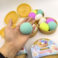 Boîte surprise de jouets sensoriels anti-stress en TPR souple à remontée lente, en forme de boulette vapeur avec visage souriant mignon, vente en gros