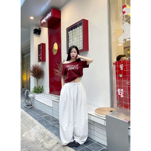 Pantalones anchos de verano blancos para mujer, estilo urbano, adelgazantes, informales, ecológicos, transpirables, con cintura elástica y detalles de encaje y cuentas. - Product Image 2