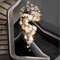 Lustre européen de luxe en cuivre et cristal avec un design de fleurs flottantes pour escalier, loft, plafond, ampoules LED