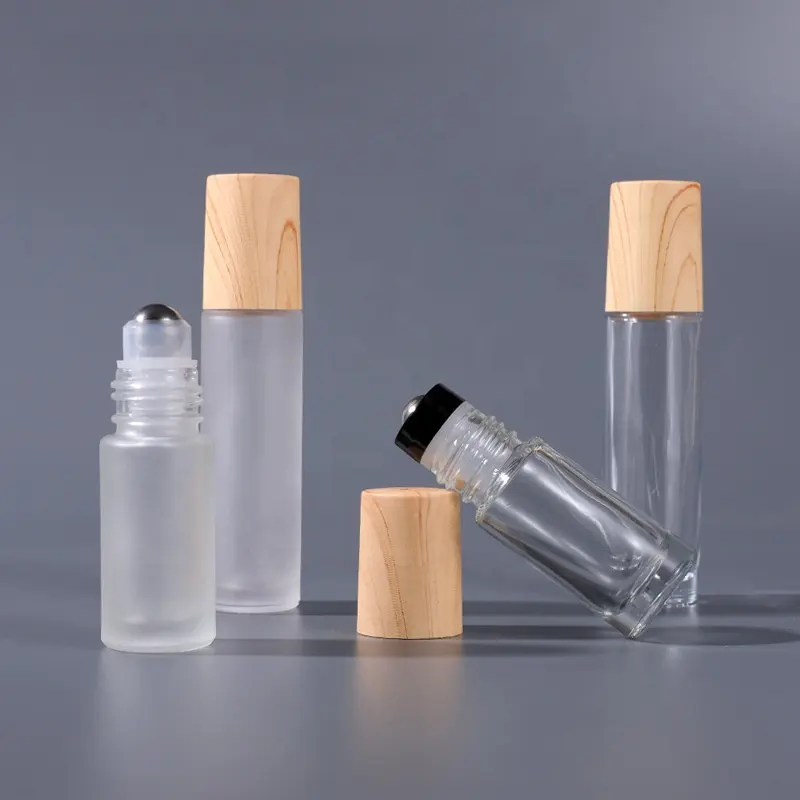 LZ حزمة منخفضة MOQ 100 قطعة 5 مللي 10 مللي لتر متجمد العين الأسطوانة زجاجة مخصصة تسمية خاصة الزجاج الضروري العطور النفط الأسطوانة زجاجة