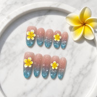 Ongles artificiels de luxe faits main en acrylique à couverture complète, motif nœud et pointe, dégradé bleu nude scintillant, forme ovale avec colle réutilisable
