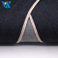 Tela Vaquera Selvedge de 12.5 oz Sin Elasticidad 100% Algodón Tela Vaquera Selvedge Cruda de Alta Calidad Azul Oscuro Tejido Twill Jeanet al por Mayor