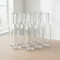 Bouteille en verre ronde de 750 ml personnalisée en usine avec bouchon en liège pour gin, whisky, vodka, spiritueux