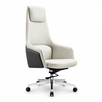 Chaise de bureau de direction ergonomique de luxe en cuir bicolore à dossier haut avec inclinaison aux genoux et pivotement verrouillable