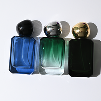 Vente en gros de flacons de parfum rectangulaires biseautés personnalisés de 50 ml avec bouchon en forme de galet irrégulier, logo personnalisé OEM disponible