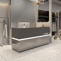 Comptoir de réception gris en acier inoxydable avec rangement pour magasins de vêtements, salons de beauté, espaces commerciaux - Design coréen moderne et minimaliste