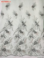 Tissus de mariée en polyester 100% à prix d'usine étincelants nouvelle broderie perlée lourde avec tissu de robe en maille durable à paillettes