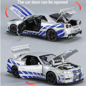 Voiture miniature Nissan <span class=keywords><strong>GTR</strong></span> <span class=keywords><strong>R34</strong></span> en alliage moulé sous pression, échelle 1:32, haute qualité, avec son et lumière, 4 portes ouvrables, batterie incluse, emballage en boîte, pour enfants - Product Image 5