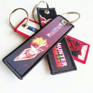 Porte-clés personnalisés en tissu tissé et brodé, vente en gros à prix abordable - Product Image 1