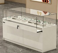 Comptoir de présentation de bijoux en verre blanc minimaliste moderne, vitrine de vente au détail verrouillable avec tiroirs de rangement
