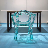 Chaise transparente moderne de qualité supérieure, style artistique et design, avec dossier et accoudoirs créatifs, idéale pour les hôtels, les salles à manger et la maison