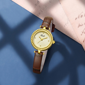 Reloj de Cuarzo para Mujer con Diseño Radiante Redondo, Pequeño, Elegante, Estilo de Cuero, Personalizado de Fábrica - Product Image 1