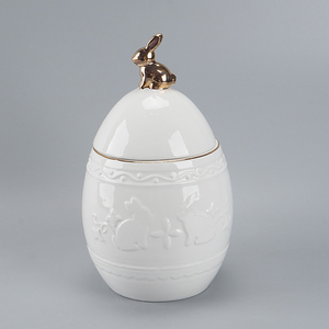 Elegante Tarro <span class=keywords><strong>de</strong></span> Almacenamiento <span class=keywords><strong>de</strong></span> Cerámica Blanca con Forma <span class=keywords><strong>de</strong></span> <span class=keywords><strong>Huevo</strong></span> <span class=keywords><strong>de</strong></span> Pascua, con Adorno <span class=keywords><strong>de</strong></span> Conejo Dorado y Patrón en Relieve - Product Image 1