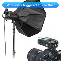 Vente chaude usine : Déclencheur de flash sans fil FSK 2,4 GHz 32 canaux pour flash de studio, interface 2,5 mm, vitesse de synchronisation 1/250s pour appareil photo