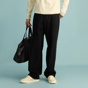 Jean pour homme en denim noir délavé, à ourlet effiloché, double épaisseur aux genoux, style hip-hop, coupe large, imprimé feuille métallisée, personnalisable ODM - Product Image 1