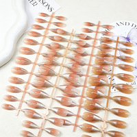 Faux ongles à presser en ABS, courts, effet dégradé rose blush, motif œil de chat coucher de soleil, pré-dessinés, pour un teint éclatant et une allure purement séduisante