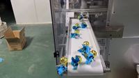 Machine d'emballage de confiseries en feuille métallique avec torsion supérieure et attache ruban, fonctionnement continu, entièrement automatisée, sur mesure