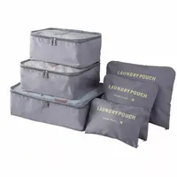 Vente en gros de vêtements de voyage colorés pour la maison sacs de rangement pour bagages