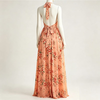 Robe longue d'été élégante à imprimé floral, col halter, décolleté plongeant, taille cintrée et fente – Style vacances