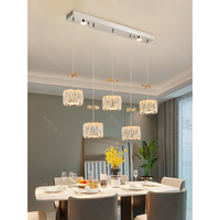 Lustre de restaurant Dengzhuo moderne, simple et luxueux, avec une lampe de table à trois têtes, créatif et