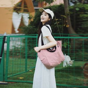 กระเป๋าผ้าแคนวาสพิมพ์โลโก้ตามสั่ง  ขนาดใหญ่ จุของได้เยอะ เหมาะสำหรับเดินทาง ท่องเที่ยว กีฬา และใช้ในชีวิตประจำวัน - Product Image 1