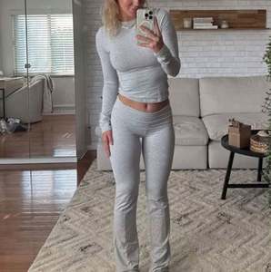 В наличии весенний однотонный сексуальный женский комплект из двух предметов с длинными рукавами и брюками - Product Image 2